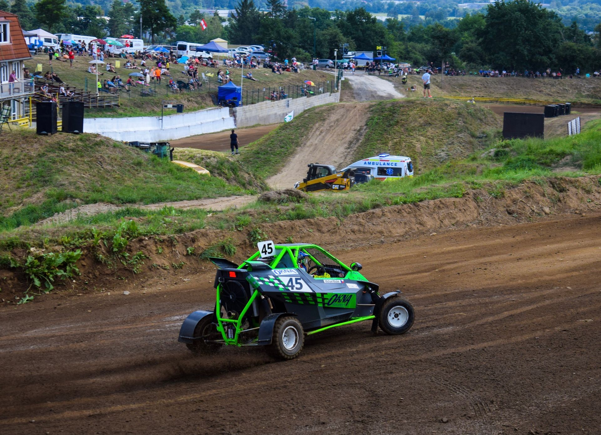 green racing car on a track